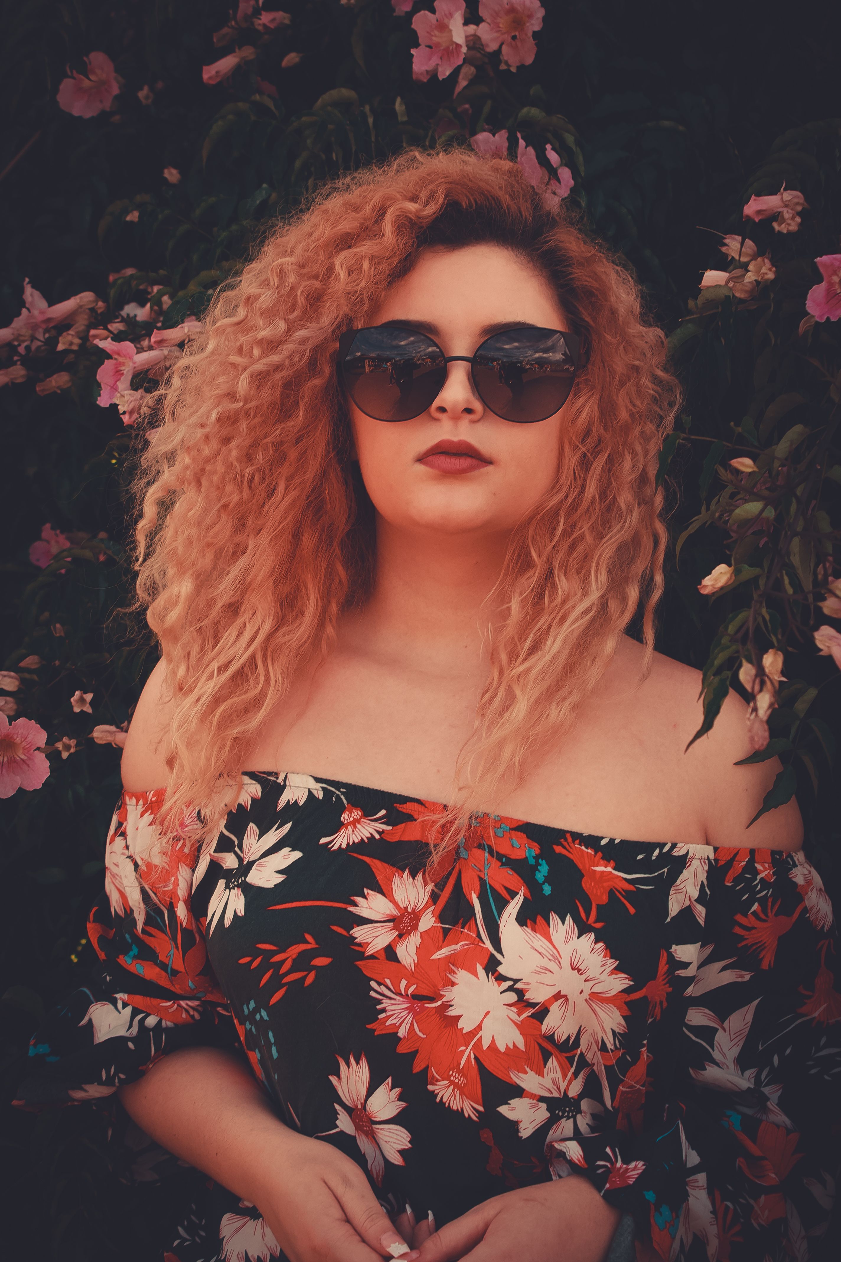 A Woman Wearing Floral Top · Free Stock Photo