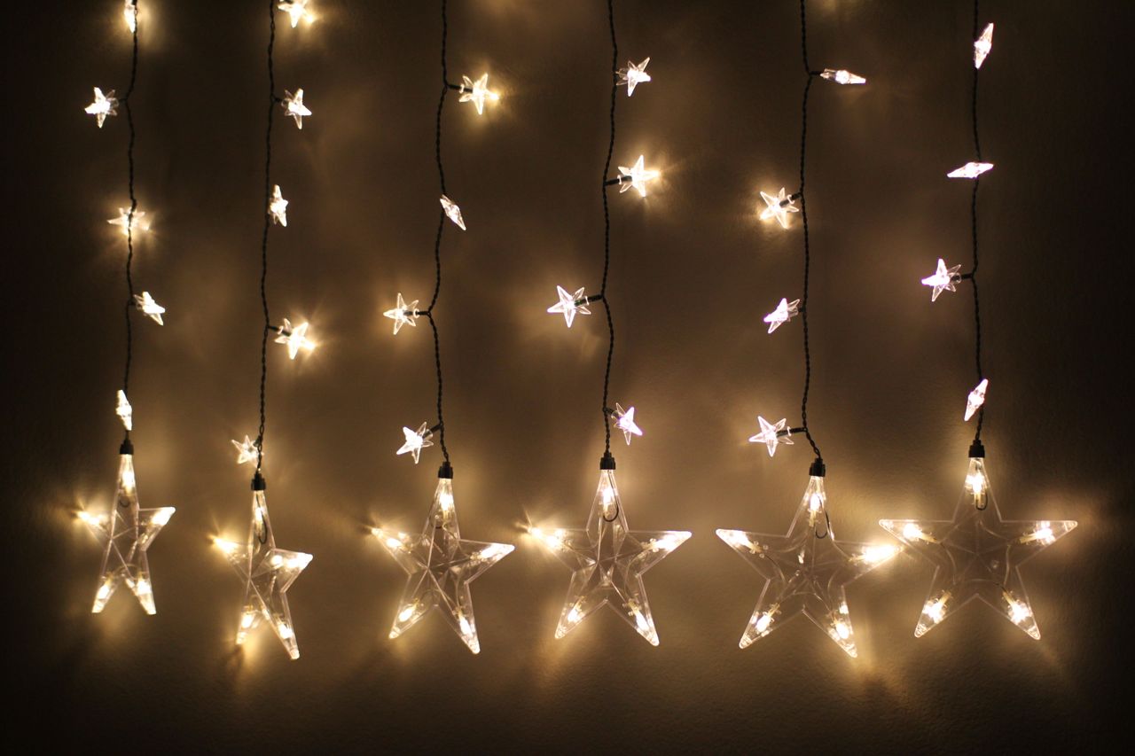 fairy-lights-boho-bedroom Bedroom glowing with warm fairy lights
