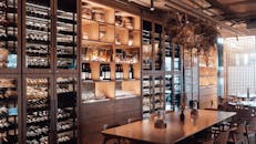 Modern restaurant with wine cellar in daylight
