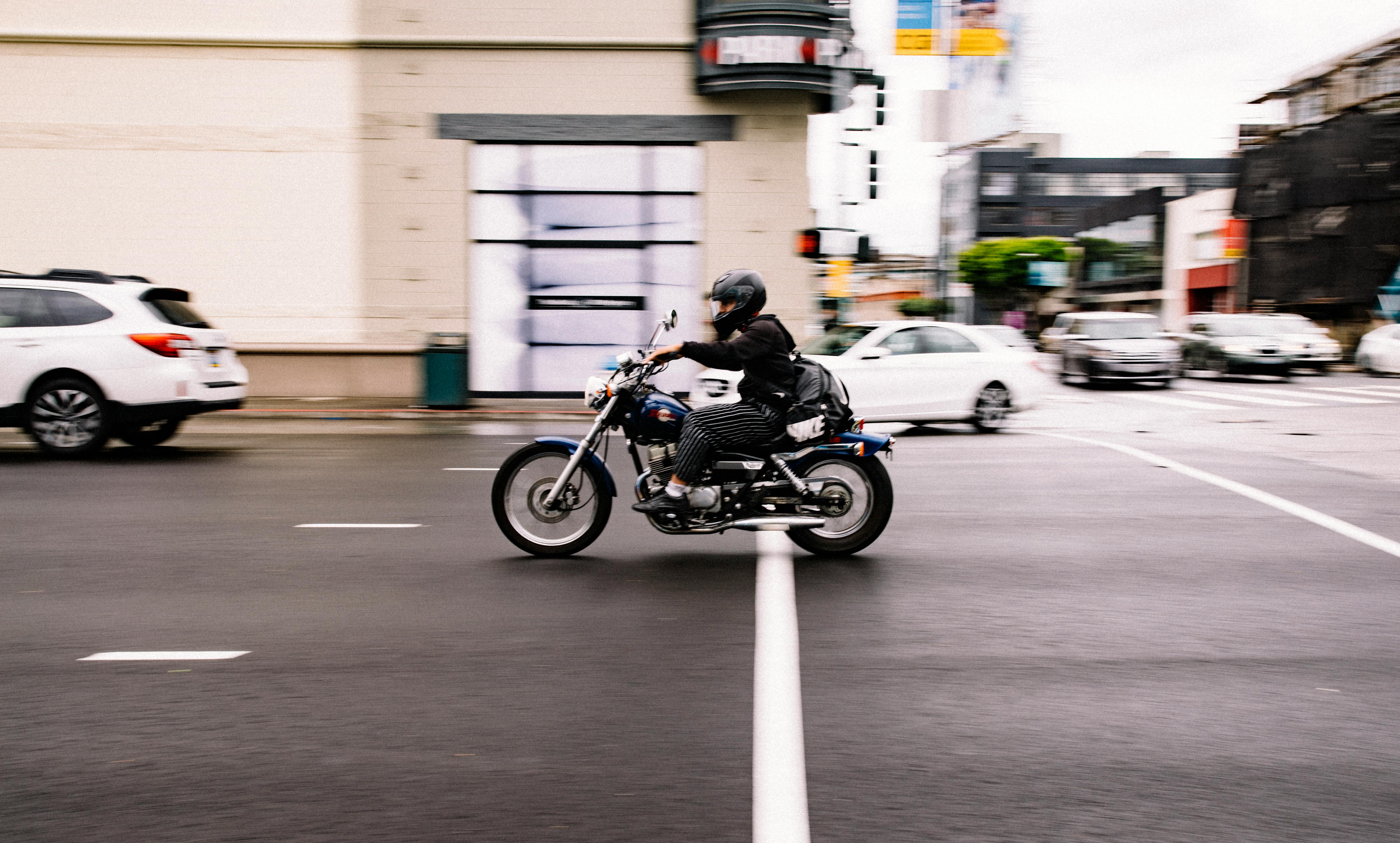 Person Riding Cruiser Motorcycle