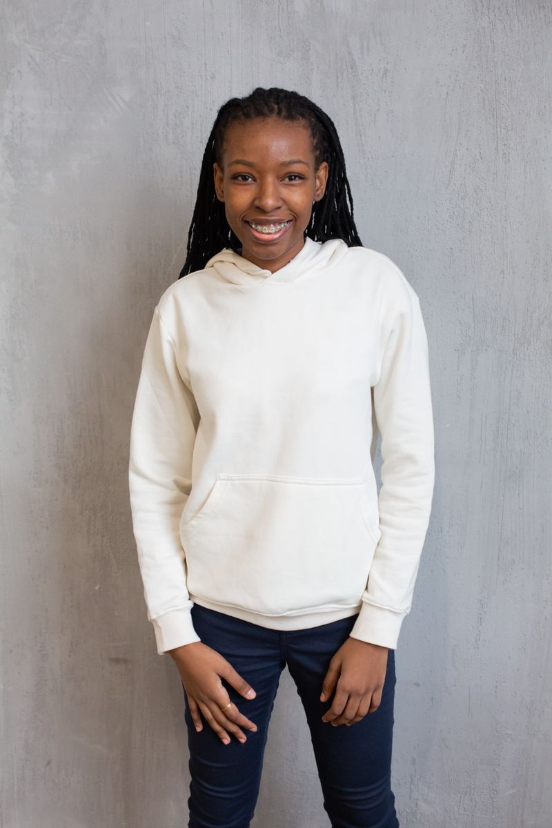 Multi-layer outfit with sweatshirt as a middle layer showing length lines