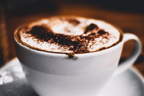 Free Latte on Ceramic Mug Stock Photo