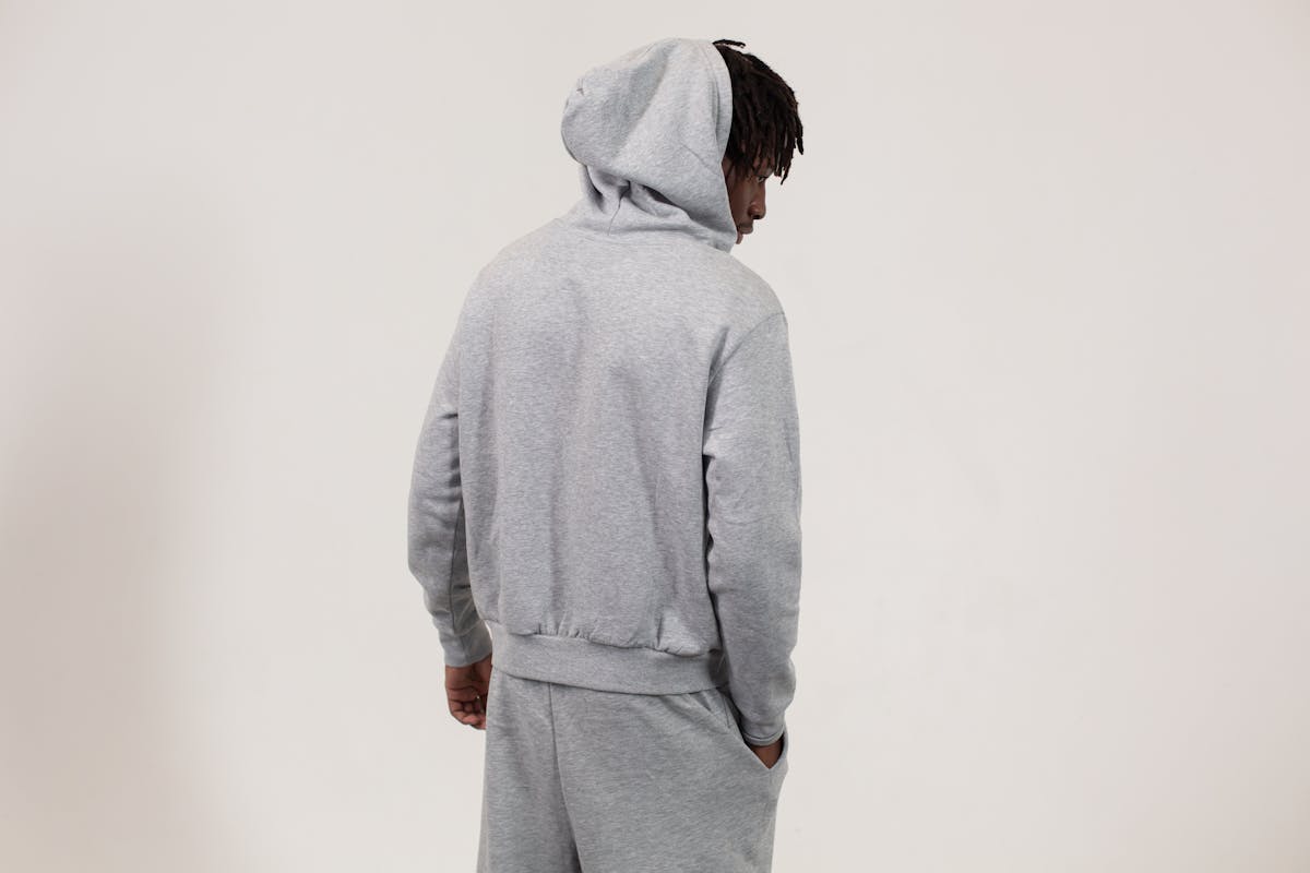 Fashion runway show featuring lace garments under bright lights