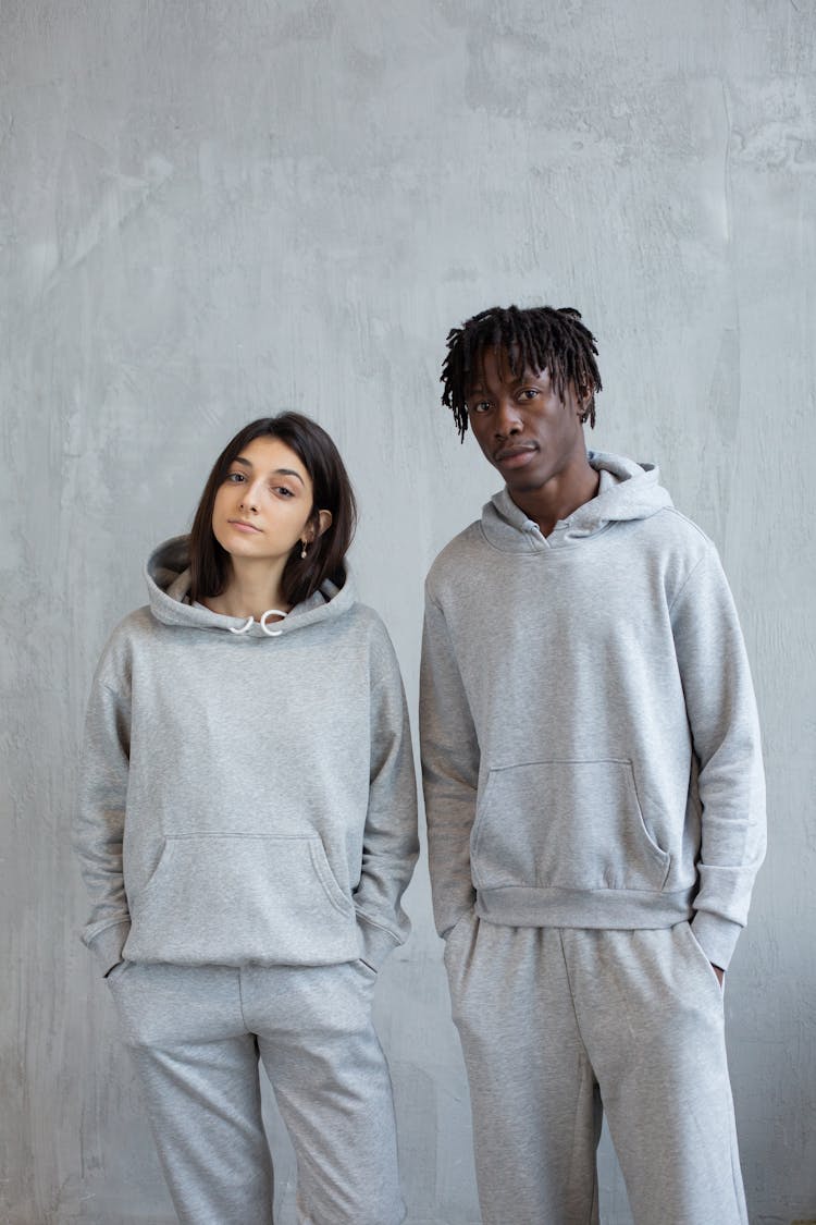 Confident Diverse Couple In Similar Clothes