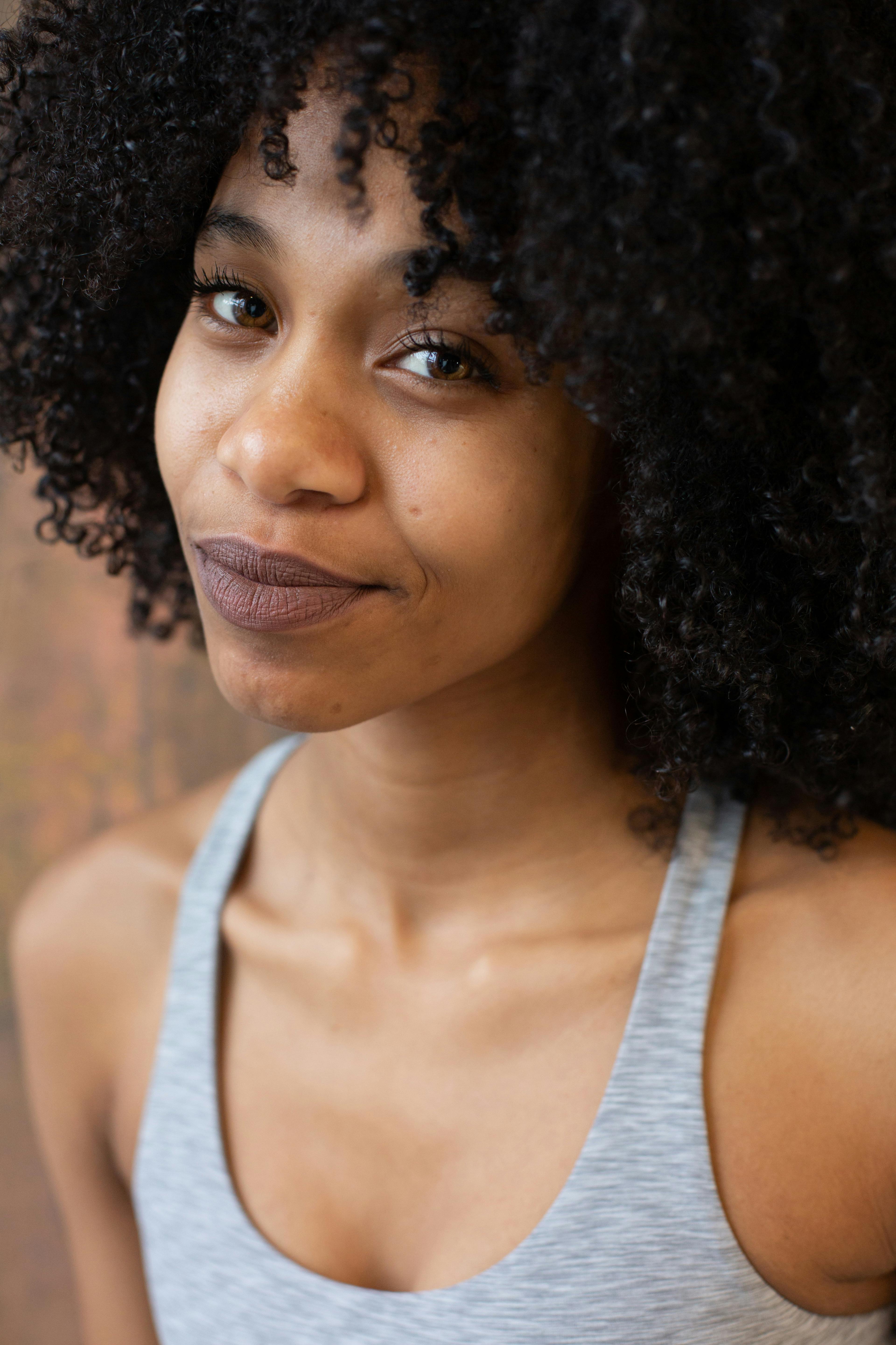 smiling black woman with afro hairstyle