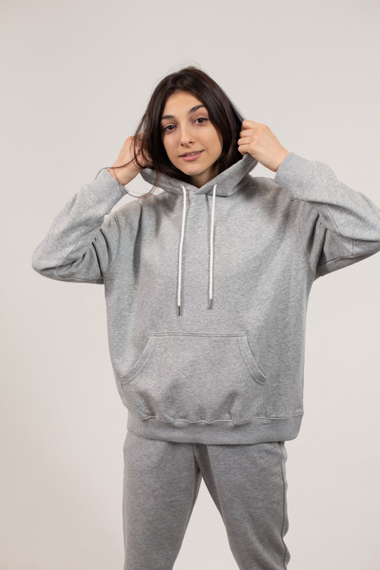 Young Stylish Woman In Gray Hoodie