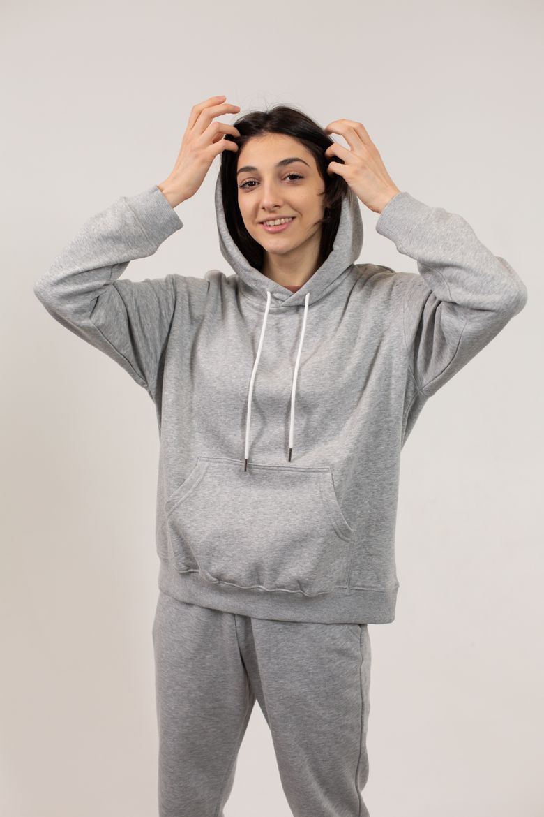 Vellum Hooded Top in grey marl &mdash; photo by Monstera Production on Pexels