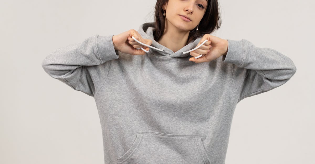 Young woman wearing oversize hoodie and pants · Free Stock Photo