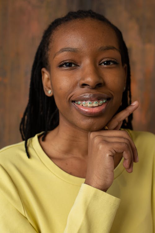 Smiling black woman with teeth braces