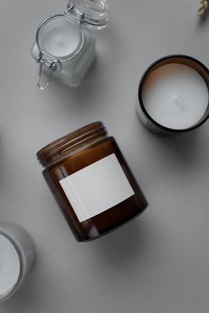 Amber glass candle jar — photo by Katrin Bolovtsova on Pexels