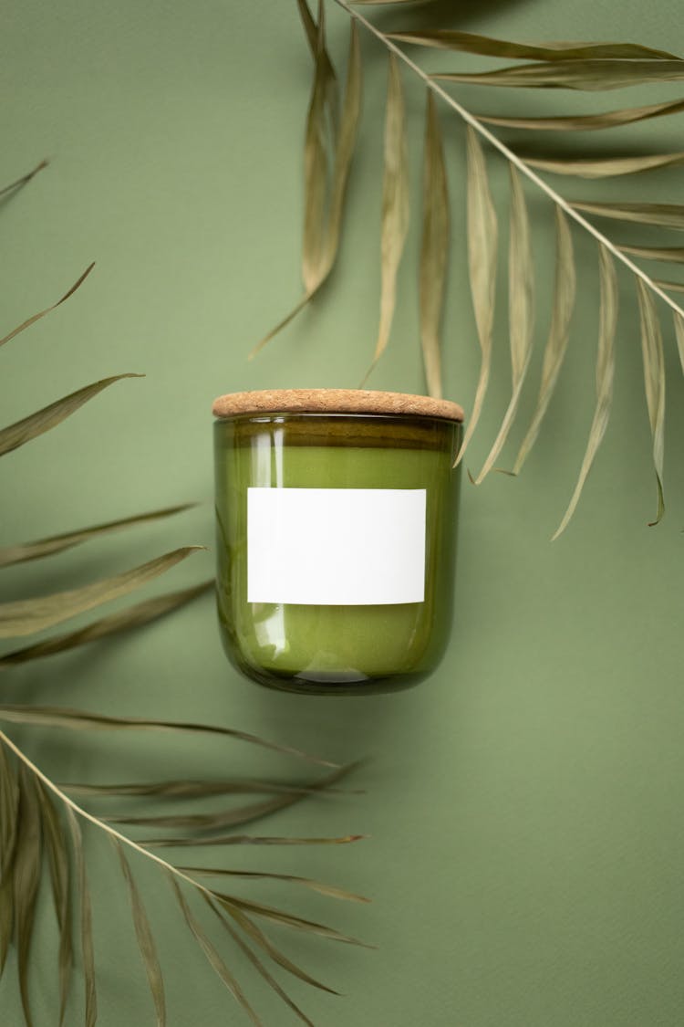 Close Up Of A Jar With A Green Paste