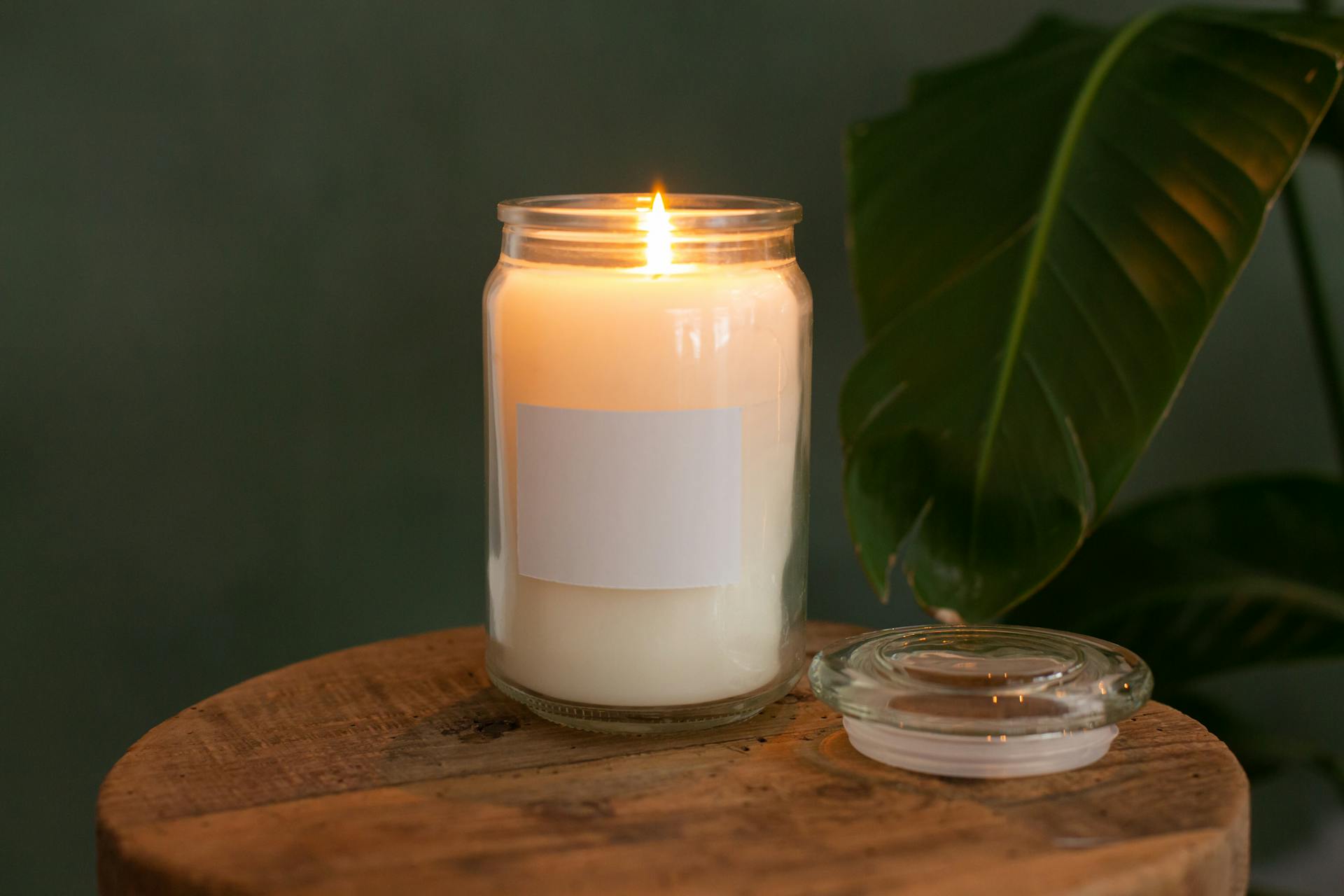 Burning Candle on a Wooden Surface