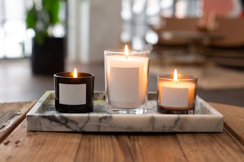 Free Lighted Candles on a Marble Tray Stock Photo