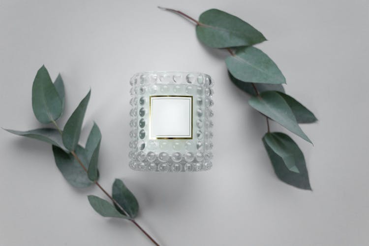 Elegant Scented Candle By Leaves