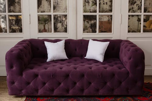 Purple Sofa with Throw Pillows