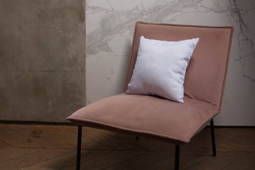 A White Pillow on a Chair