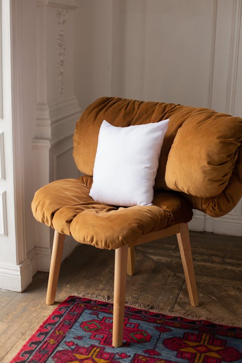 A White Pillow on a Chair