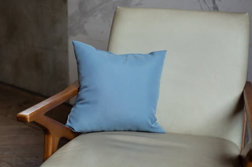 A Blue Pillow on a Chair