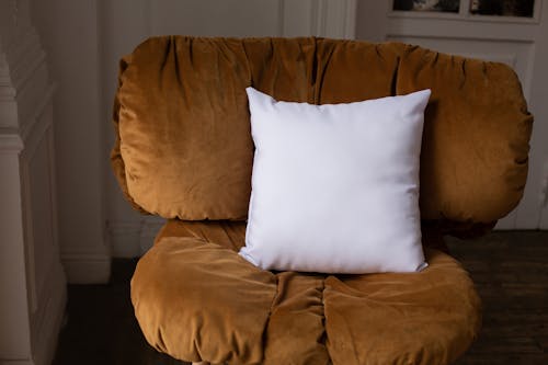 Throw Pillow on a Brown Chair