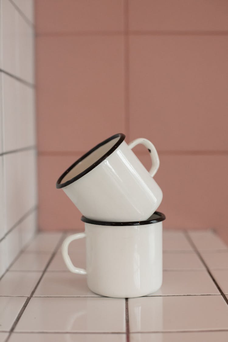 White Cups On Tiles