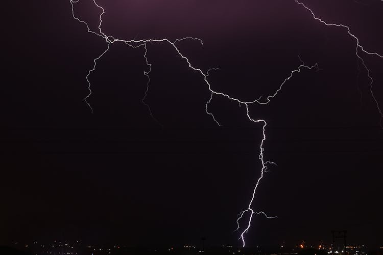 Strikes Of Lightning In The Night Sky