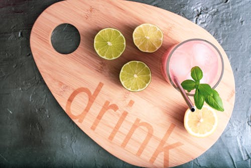 Free Cocktail Drink on Wooden Platter Stock Photo