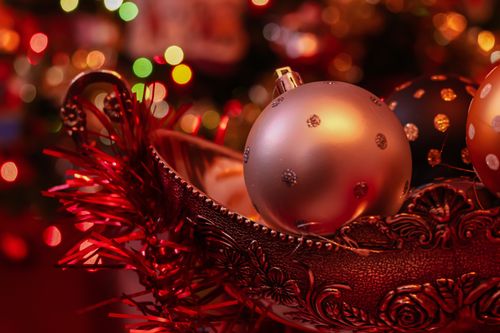 Free Close-up of colorful Christmas ornaments in a decorative bowl, capturing the festive holiday spirit. Stock Photo