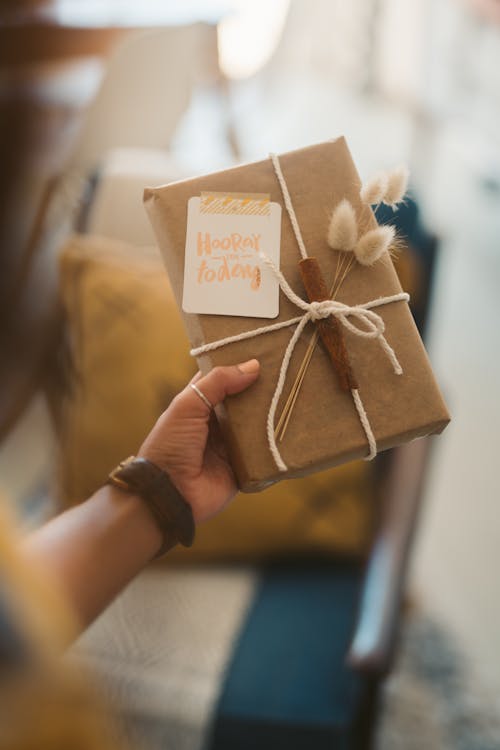 A Person Holding Gift