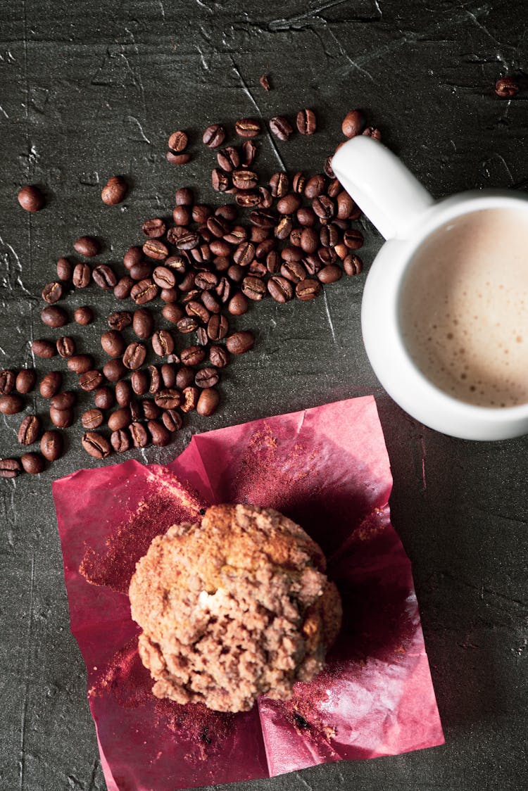 Overhead Shot Of A Muffin And Coffee