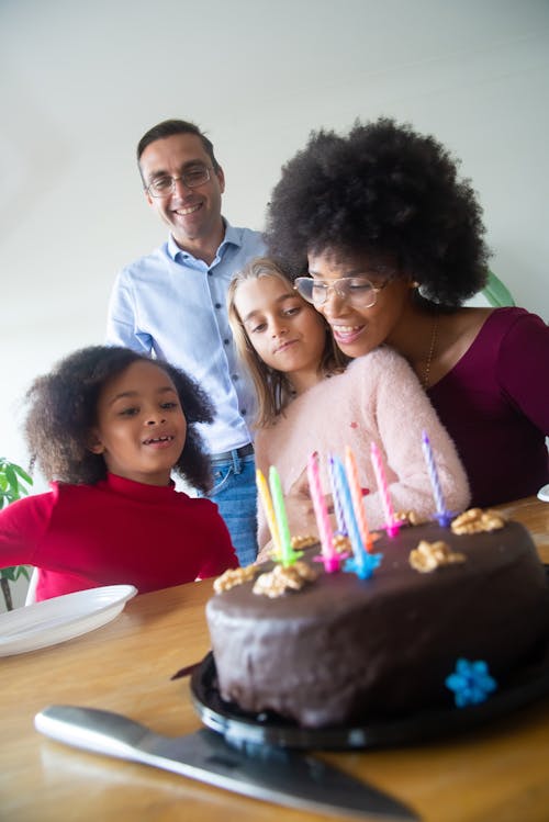 Free A  Girl Celebrating her Birthday with her Family Stock Photo