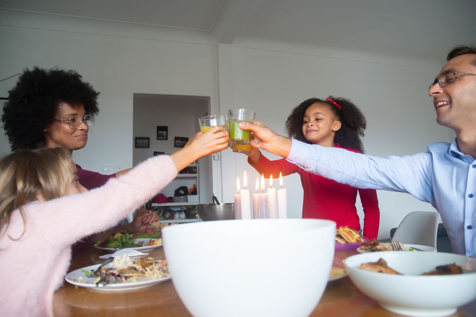 happy guests clinking glasses - christmas food catering happy guests clinking glasses - christmas food catering