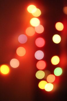 Vibrant bokeh lights in warm colors, perfect for wallpaper or abstract backgrounds.