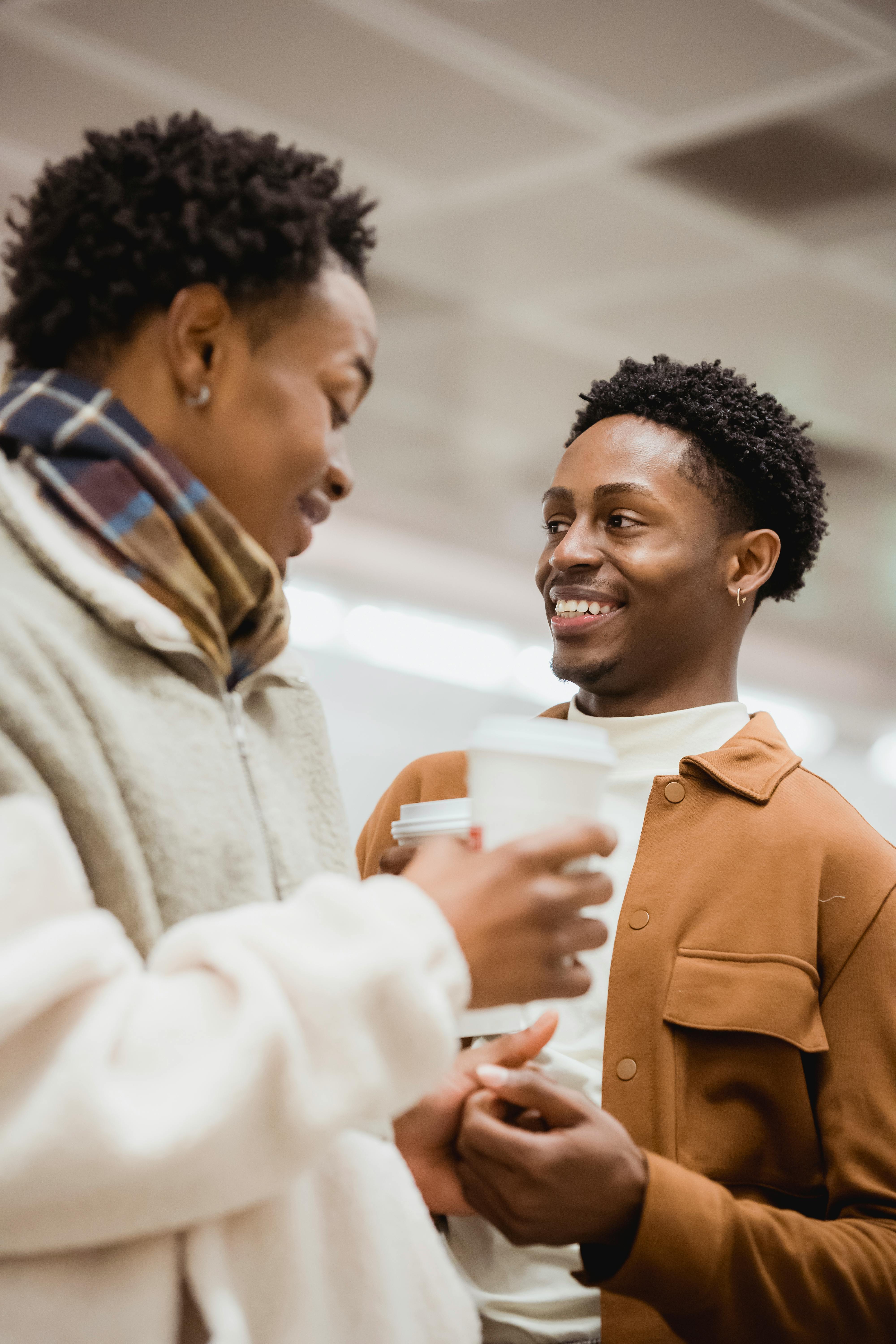 black boyfriends smiling and enjoying communication