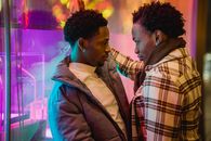 Loving black gays near building