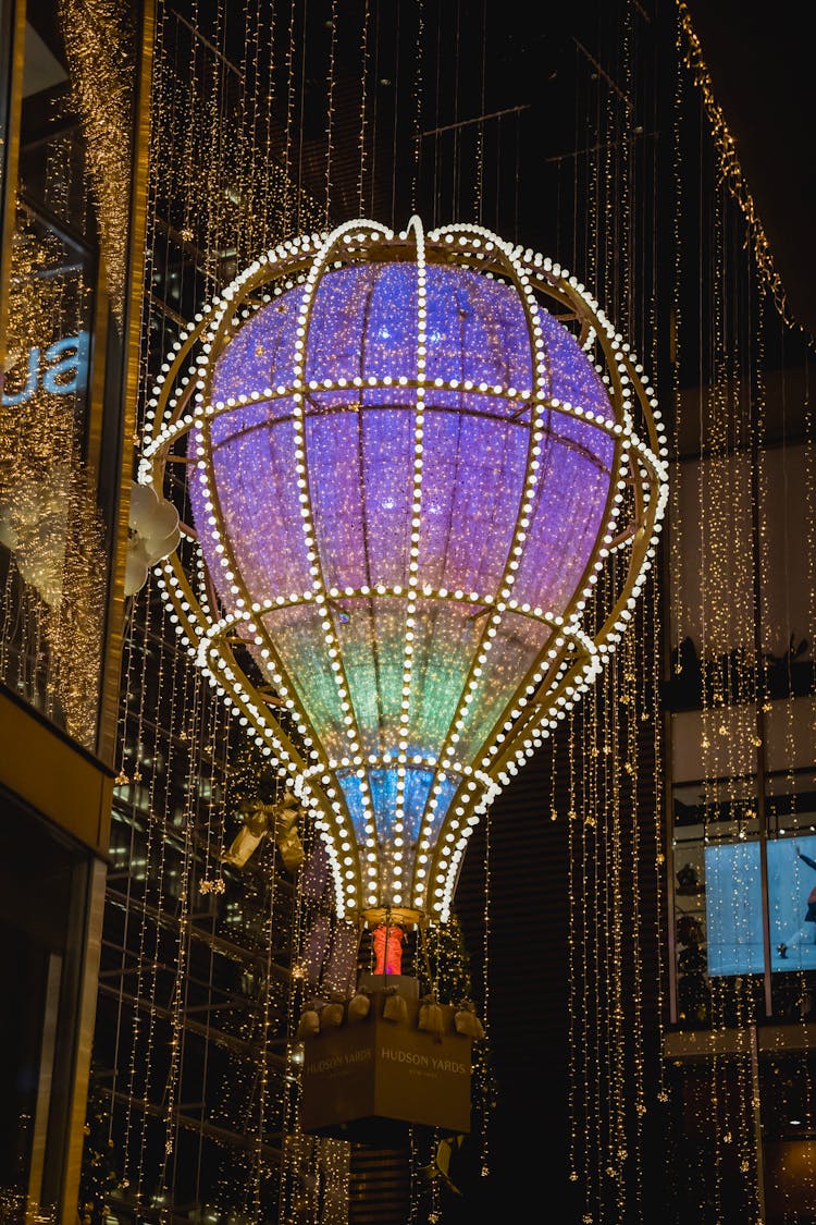 Balloon With Glowing Lights In Modern Tower