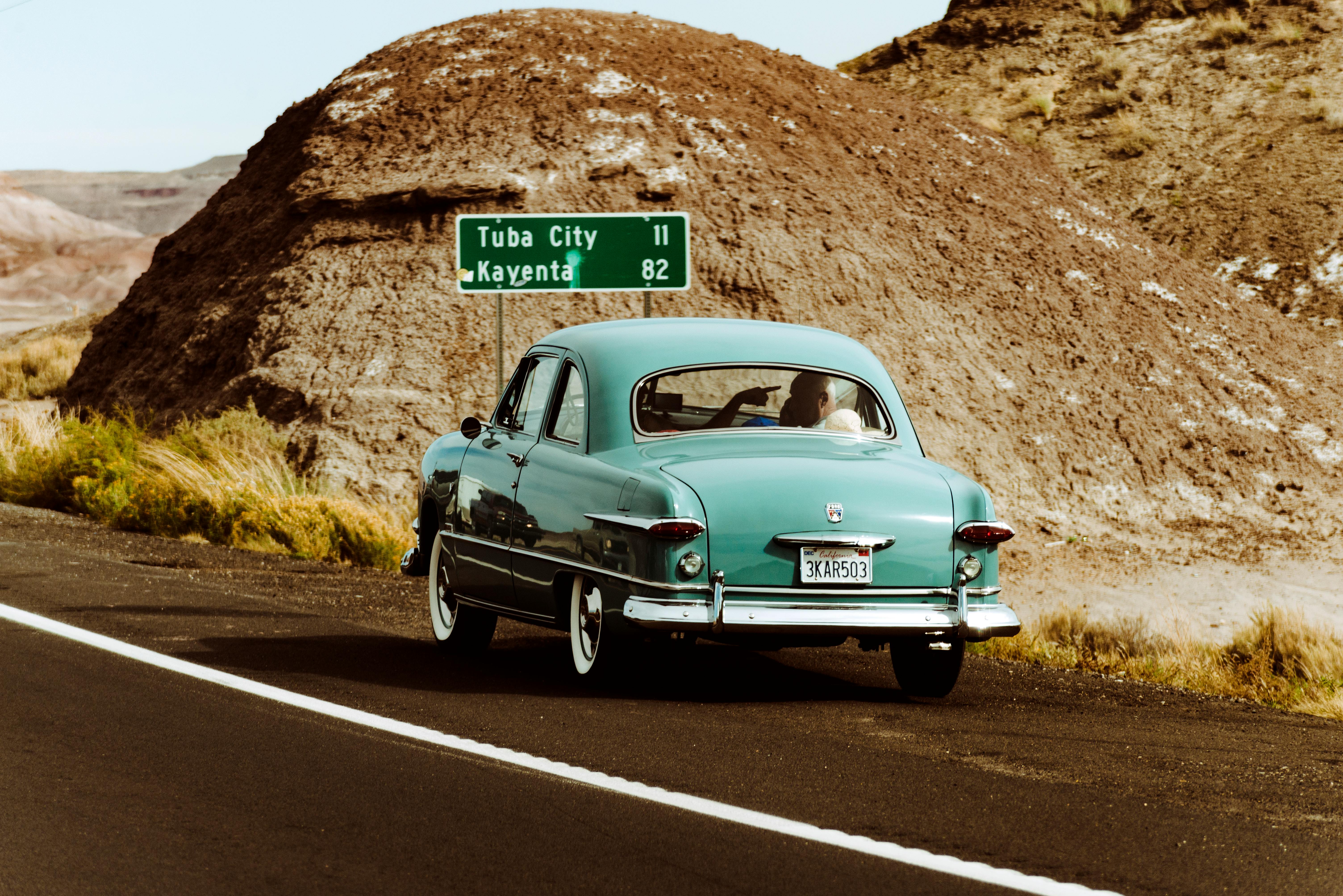 teal volkswagen beetle