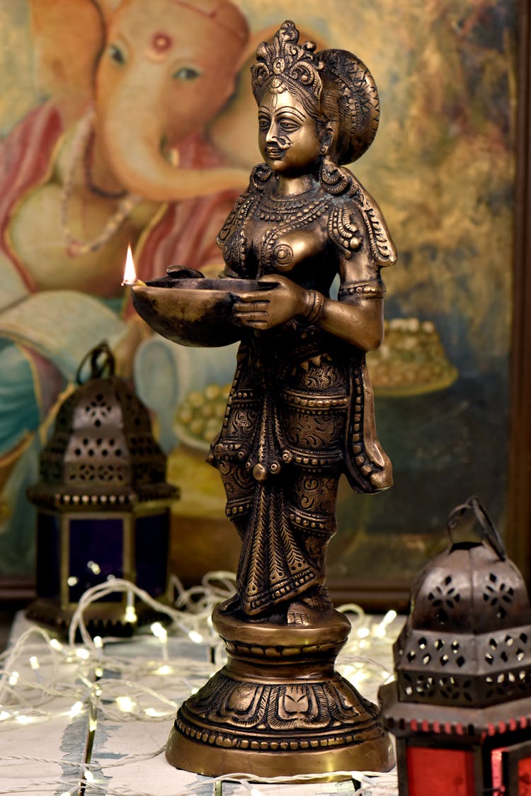 Close-up Of A Brass Lakshmi Statue