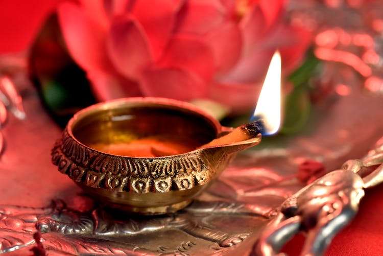 Close-up Of A Lighted Diya