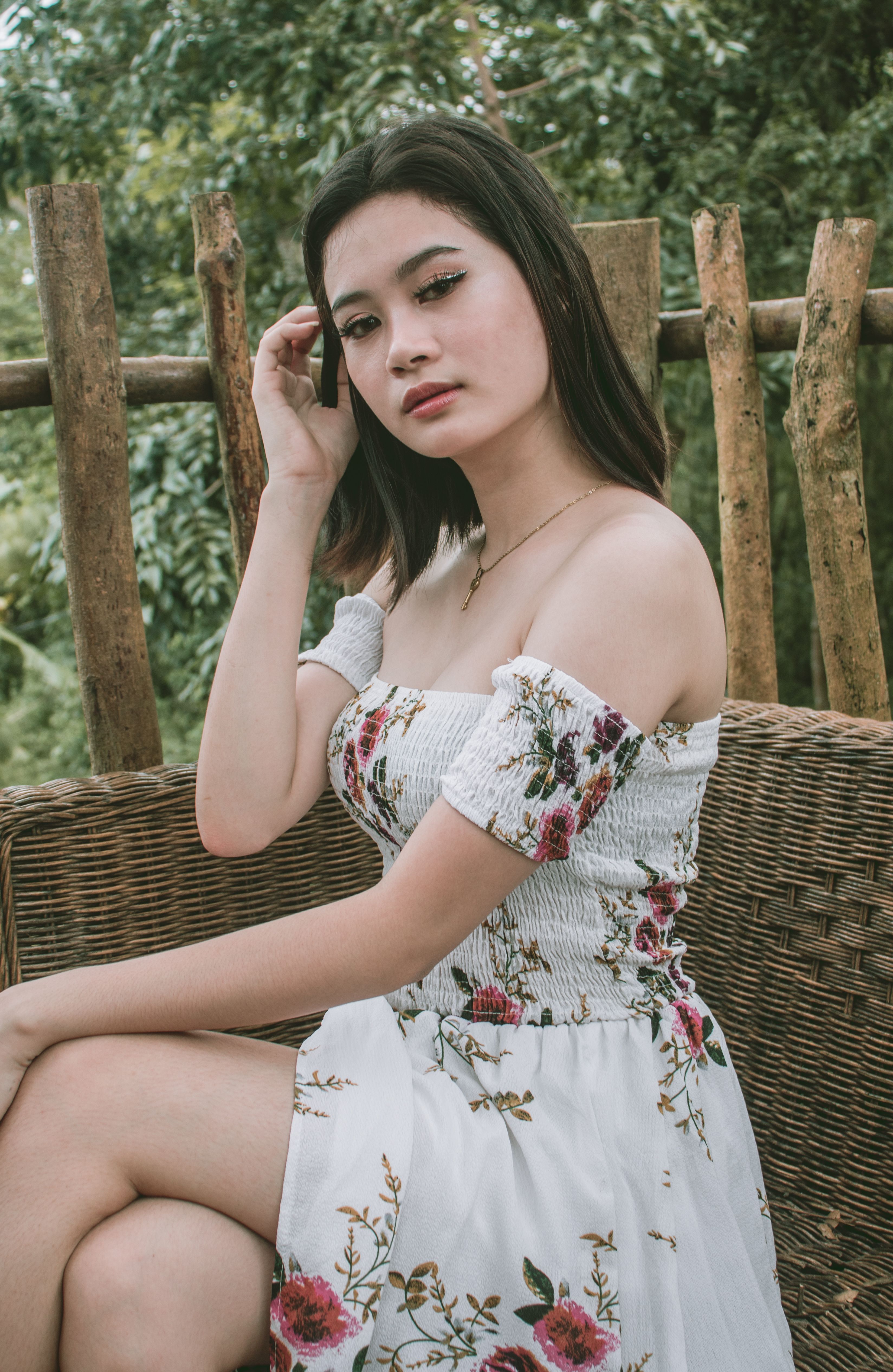 A Young Woman in a Floral Dress · Free Stock Photo