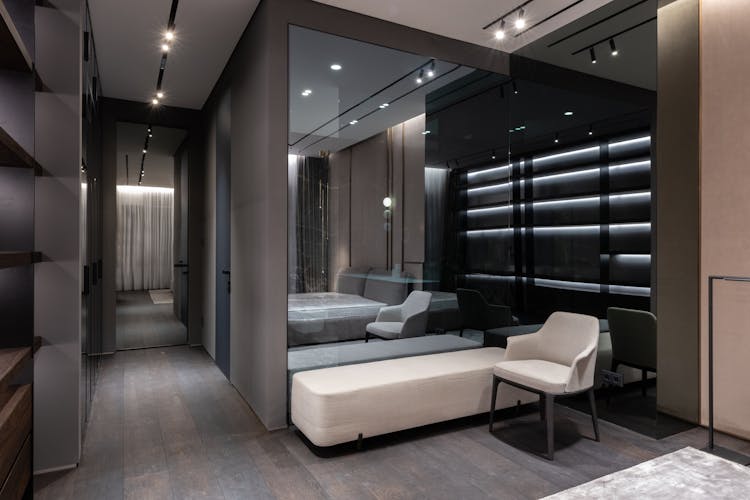 Modern Furniture And Big Mirror In Bedroom