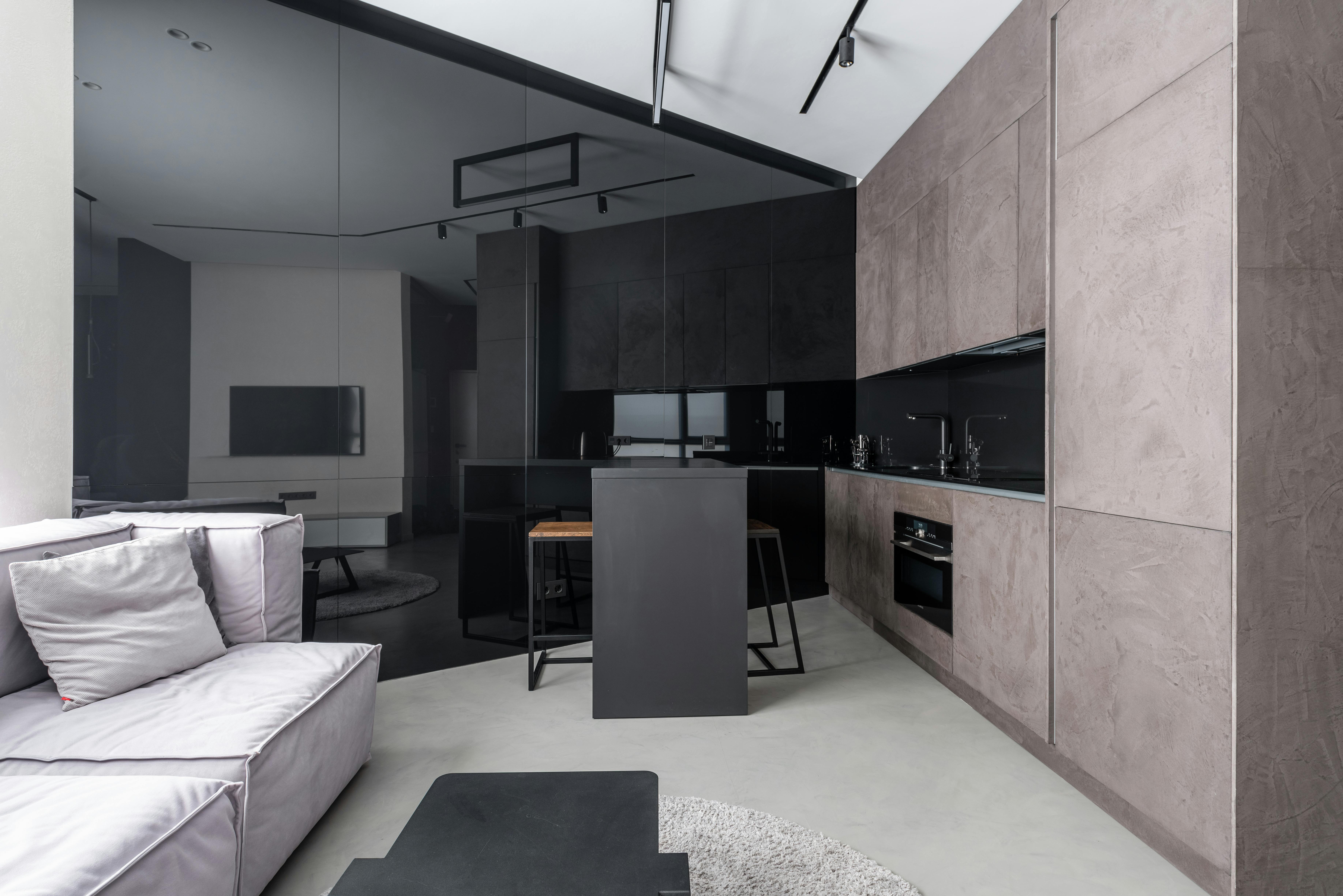 Sleek contemporary apartment kitchen with modern design elements and minimalist decor.