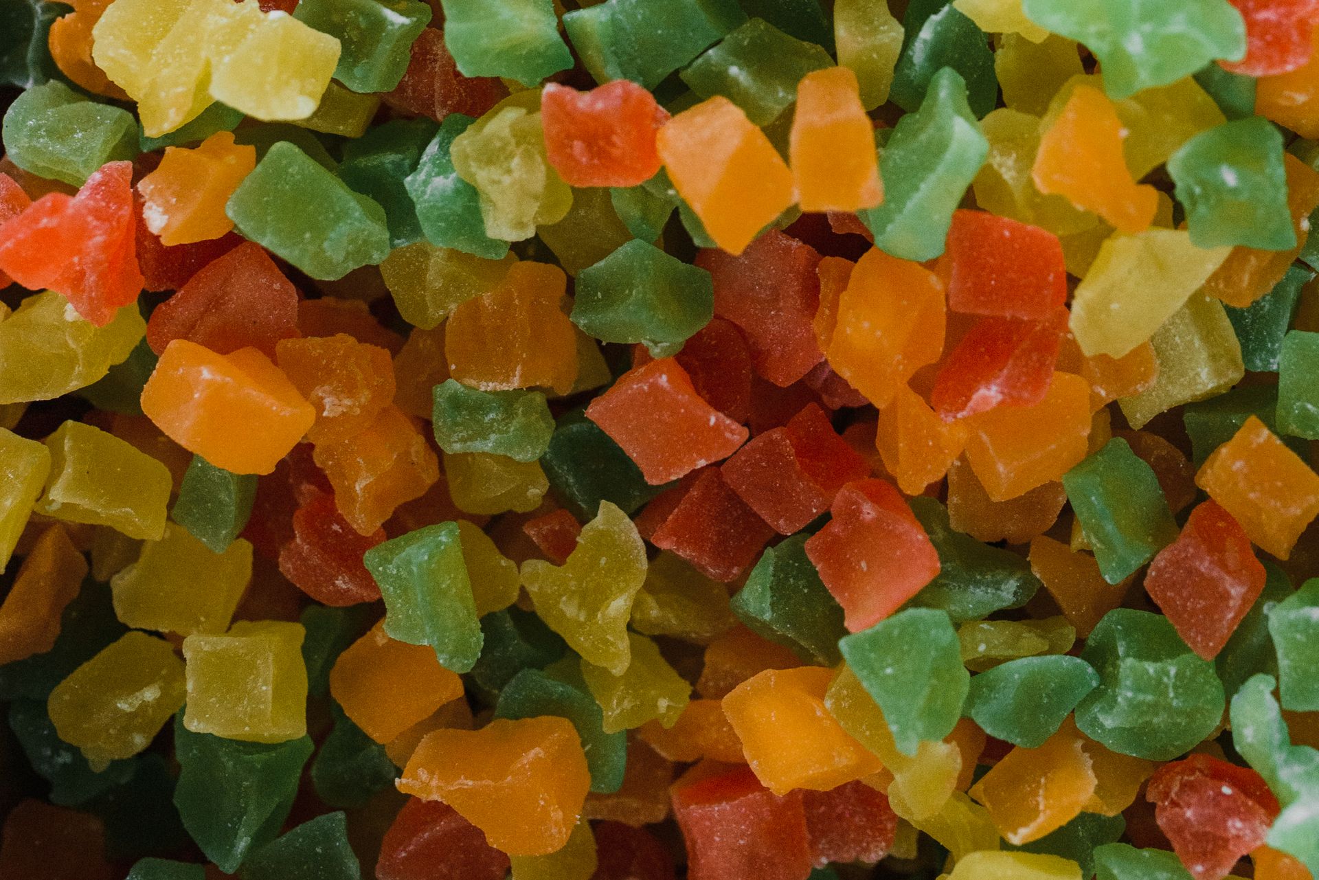 Vibrant close-up of assorted gummy candies evoking a sense of variety and flavor.