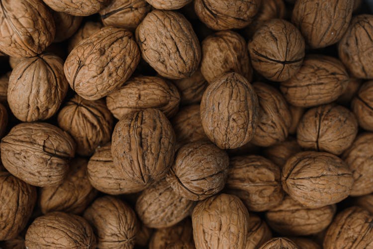 Overhead Shot Of Shelled Walnuts