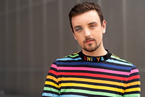 Free A Man Wearing a Rainbow Shirt Stock Photo