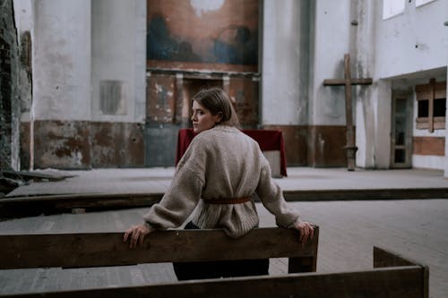 Free A Woman in an Abandoned Church Stock Photo