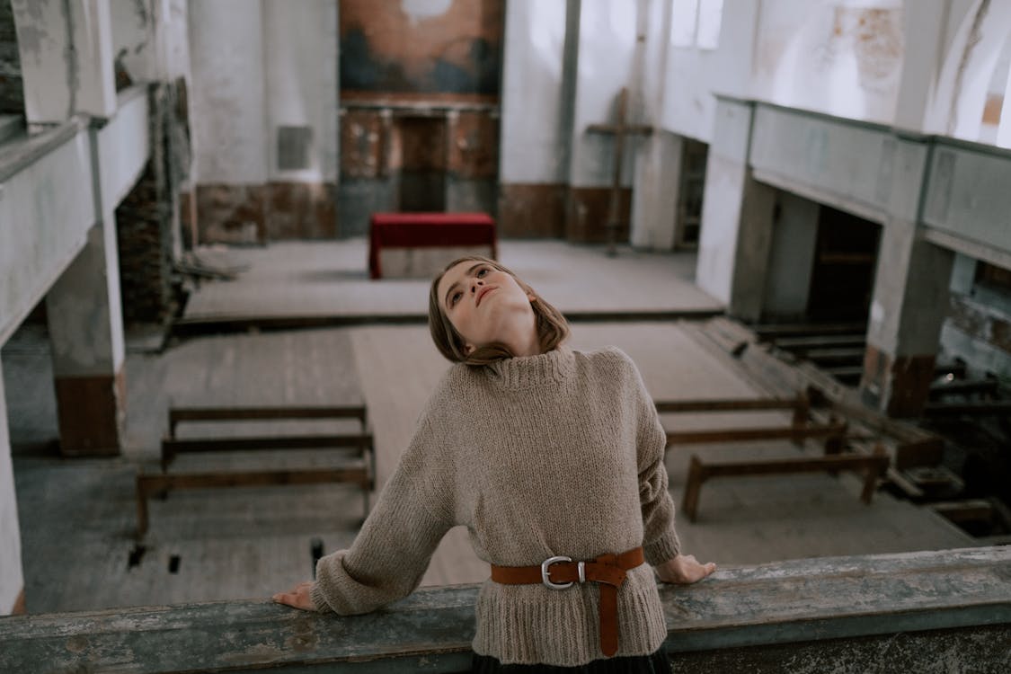 Free A Woman at an Abandoned Church Stock Photo