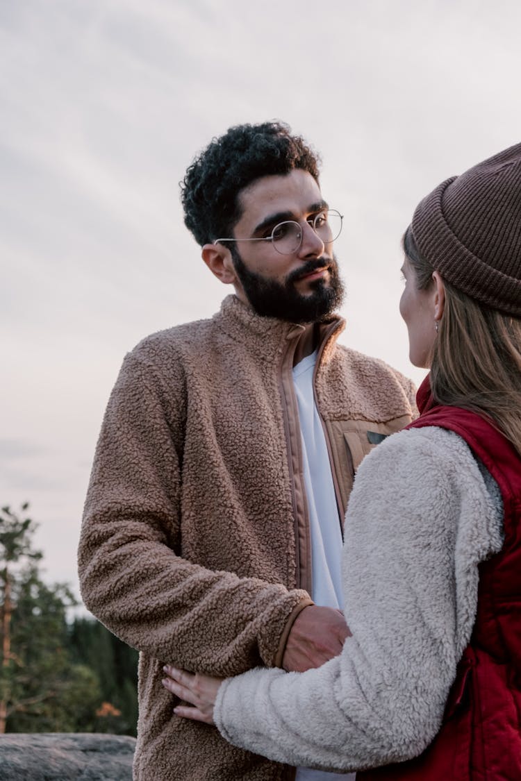 Man And Woman In Fleece Sweaters