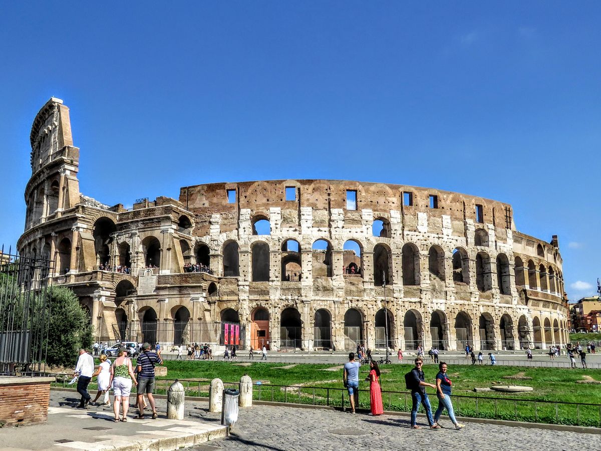 Tourists outside the Colosseum in Rome