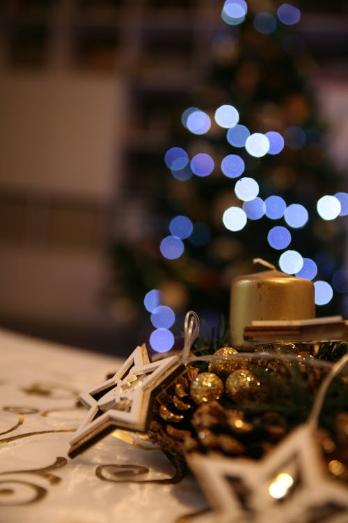 Christmas Decorations and a Gold Candle