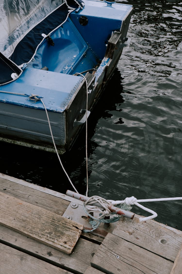 The Stern Of A Motorboat In The Water